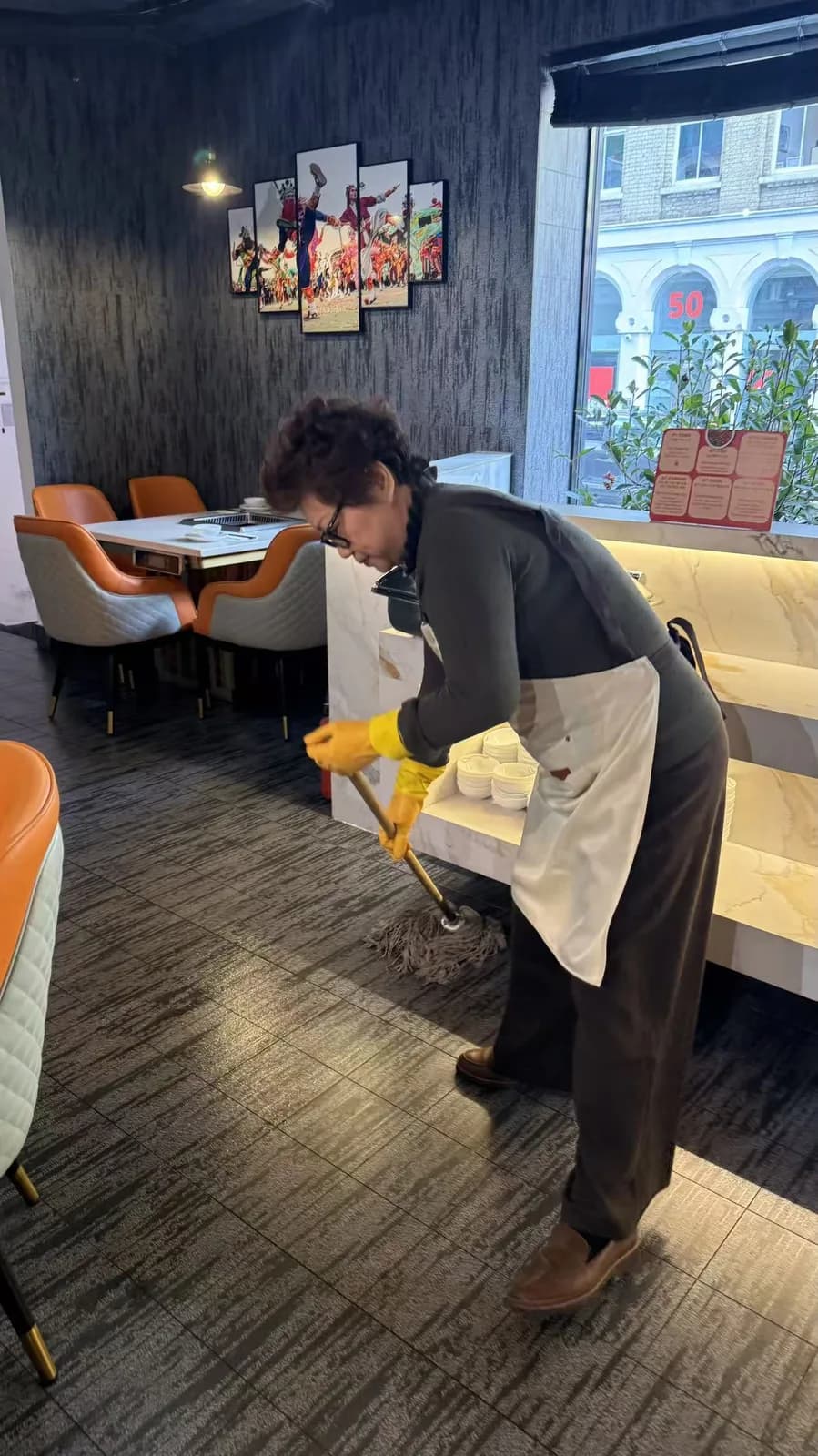 Ping Jie cleaning by the window seats